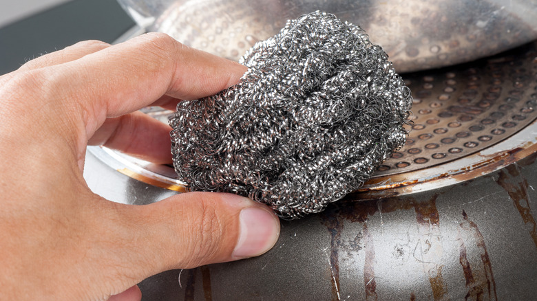 steel wool scrubbing pan