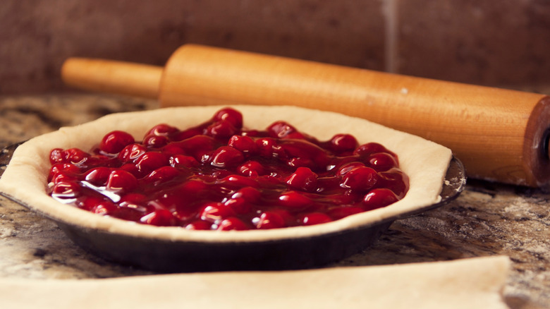Close-up of a cherry pie before the top crust is placed