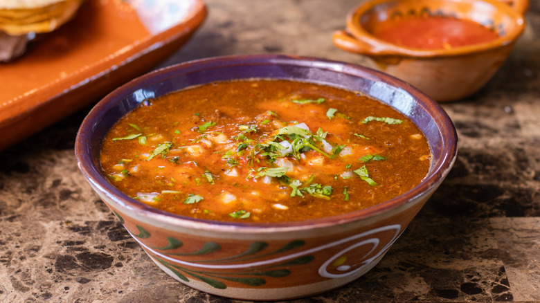 stewed birria in a traditional Mexican pottery bowl
