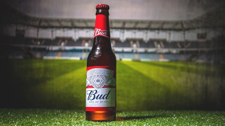 Budweiser bottle on soccer field