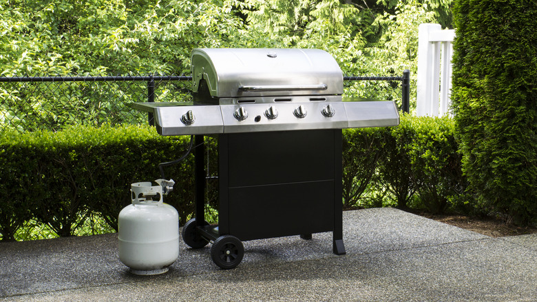 gas grill on an outdoor patio
