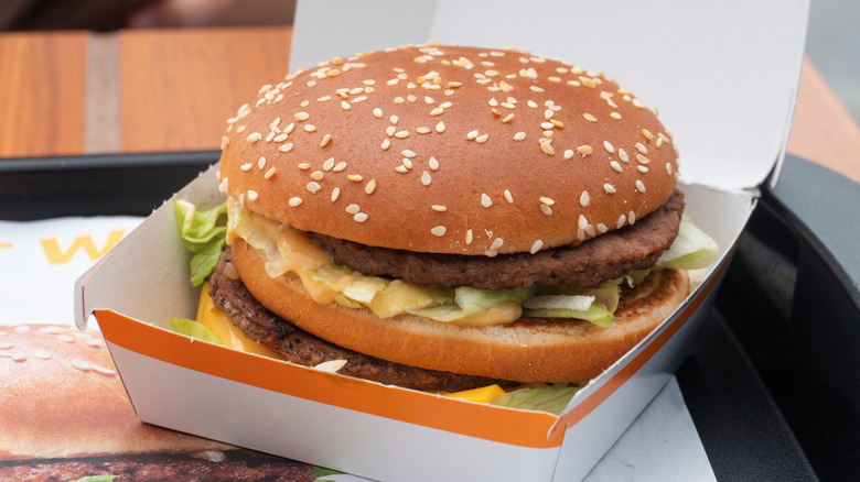 A Big Mac on a tray in McDonald's.