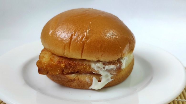 McDonald's Filet-O-Fish sitting on white plate