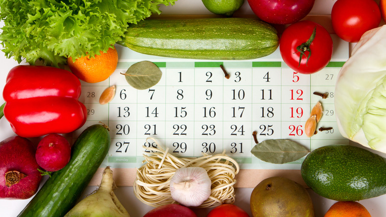 Calendar surrounded by vegetables