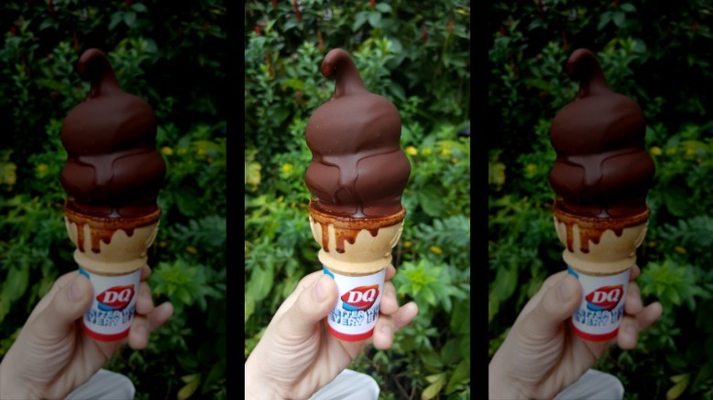 Dairy Queen dipped cone being held outdoors