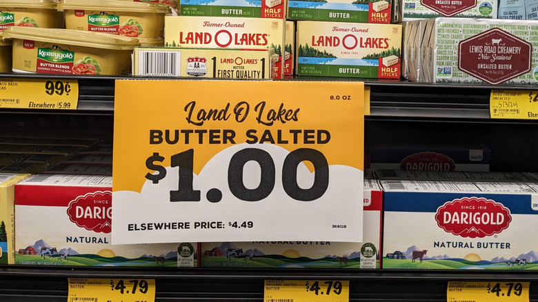 Grocery Outlet price tag for butter with "elsewhere" pricing listed.