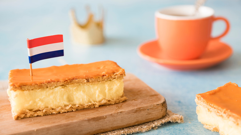 A pastry on a plate with a Dutch flag