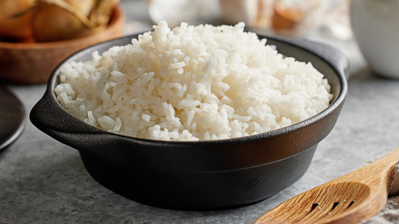 A donabe full of fluffy freshly cooked white rice