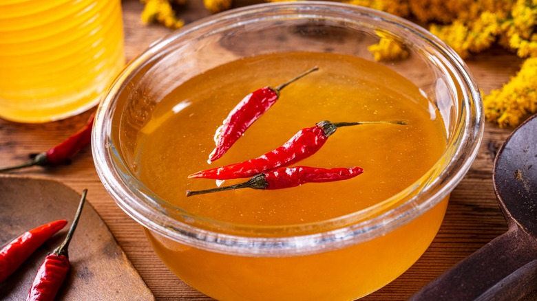 Bowl of hot chili infused honey