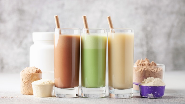 Three protein shakes and powders