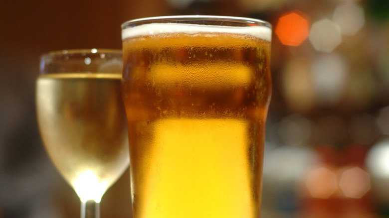 Glasses of beer and white wine