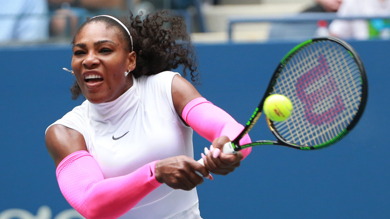 Serena Williams hitting tennis ball