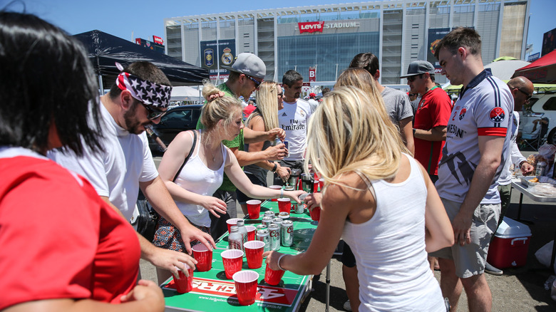 people with beer at Coors Field