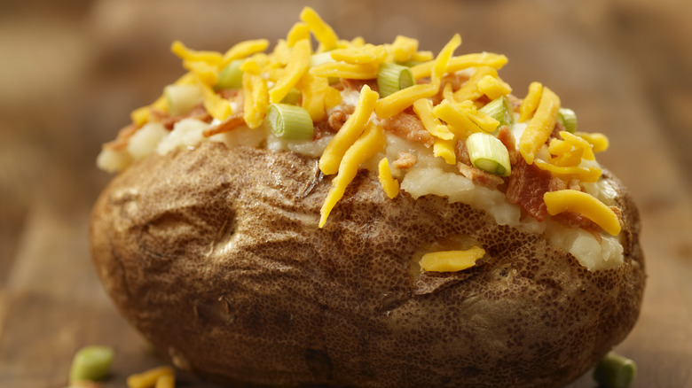 baked potato topped with cheese