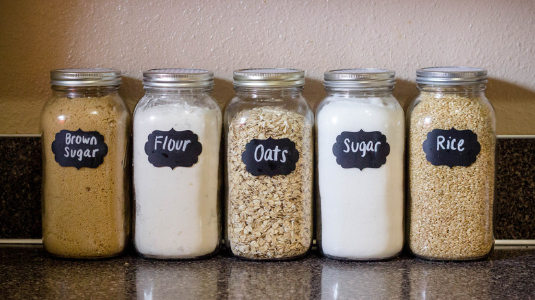 pantry ingredients in jars with labels