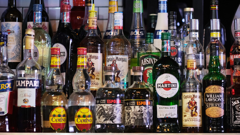 Name-brand bottles of liquor behind the bar