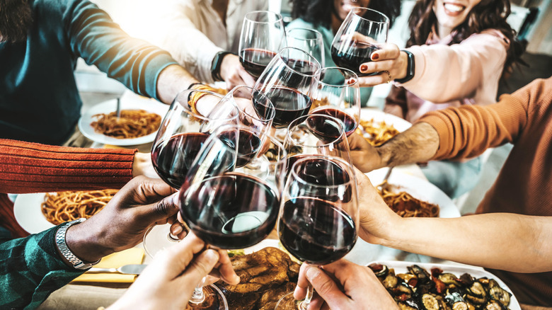 Friends sharing dinner and wine