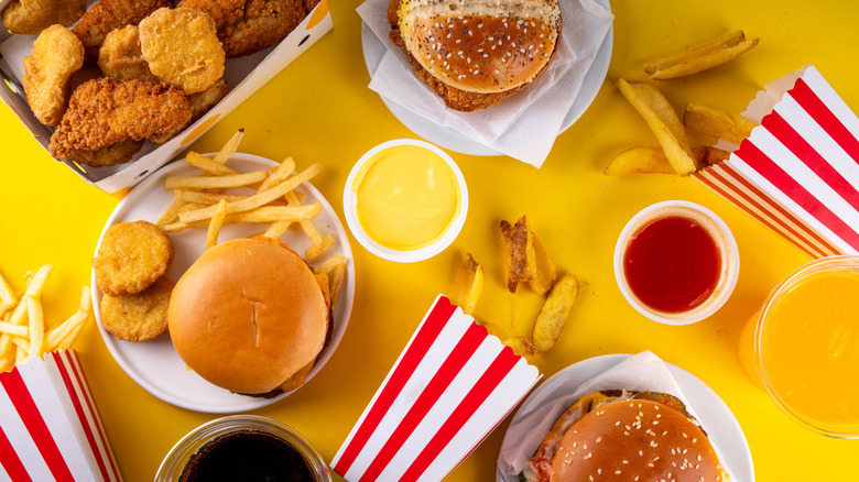Fast food spread of burgers, fries, and nuggets