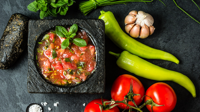Salsa surrounded by its ingredients