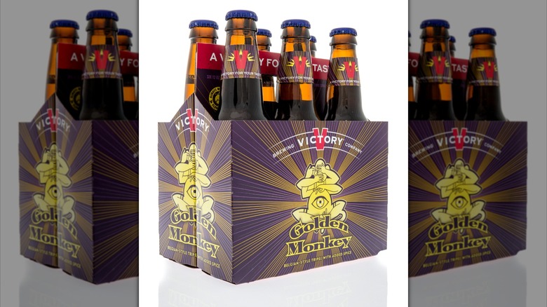 Six-pack of Victory Golden Monkey beer bottles