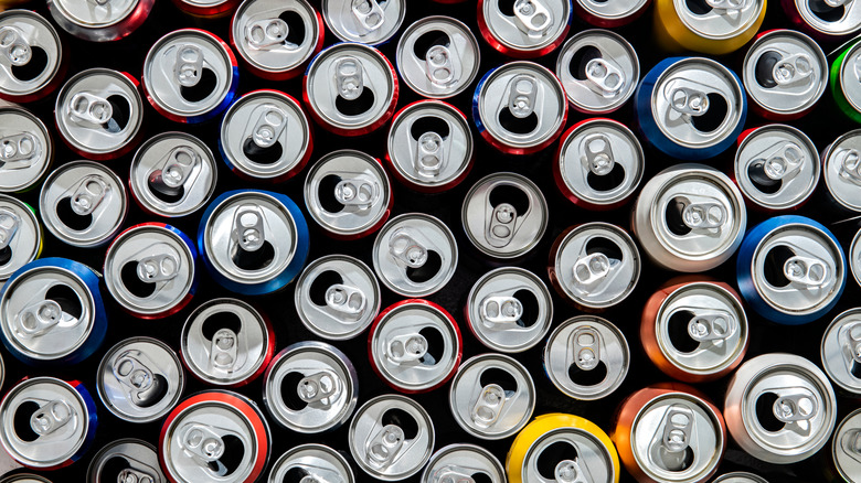 Many opened aluminum beverage cans 