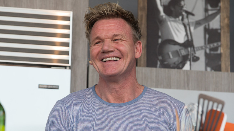 Headshot of Gordon Ramsay smiling during cooking demo