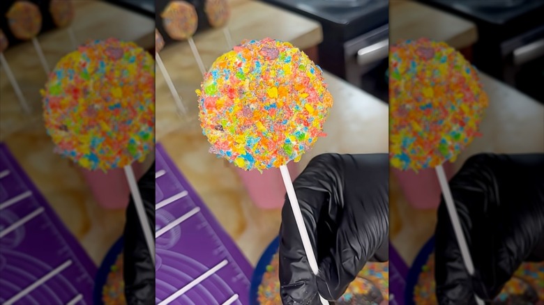 cereal pop covered in Fruity Pebbles cereal