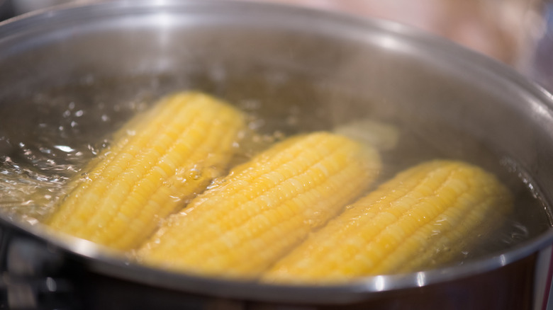 Corn on the cob in boiling water