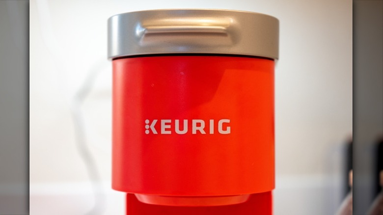 close up of a red keurig coffee maker