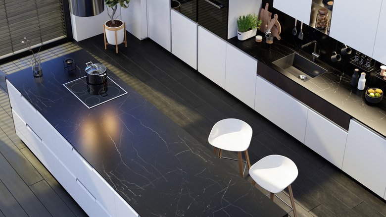 Modern kitchen with dark granite countertops