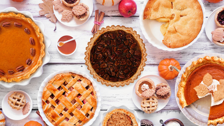 fall pies with decorations on a table
