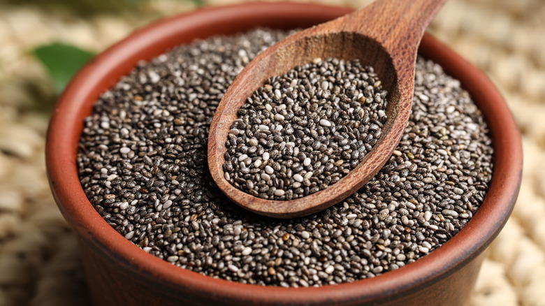 Chia seeds in wooden bowl