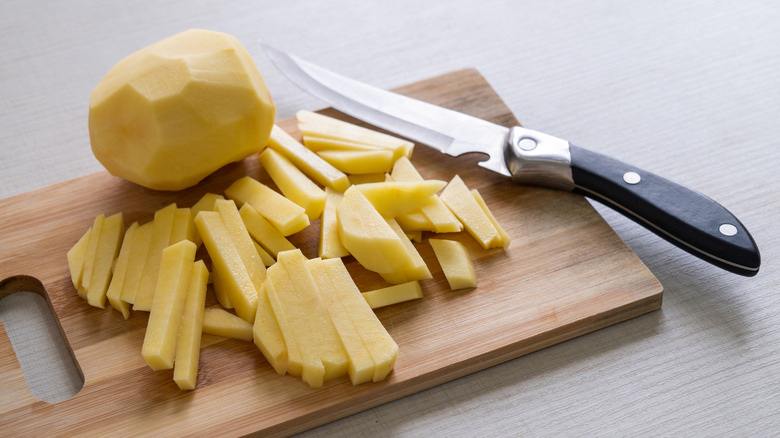 cut peeled potatoes