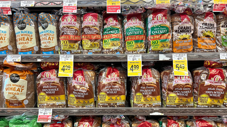 various bags of bread at a grocery store