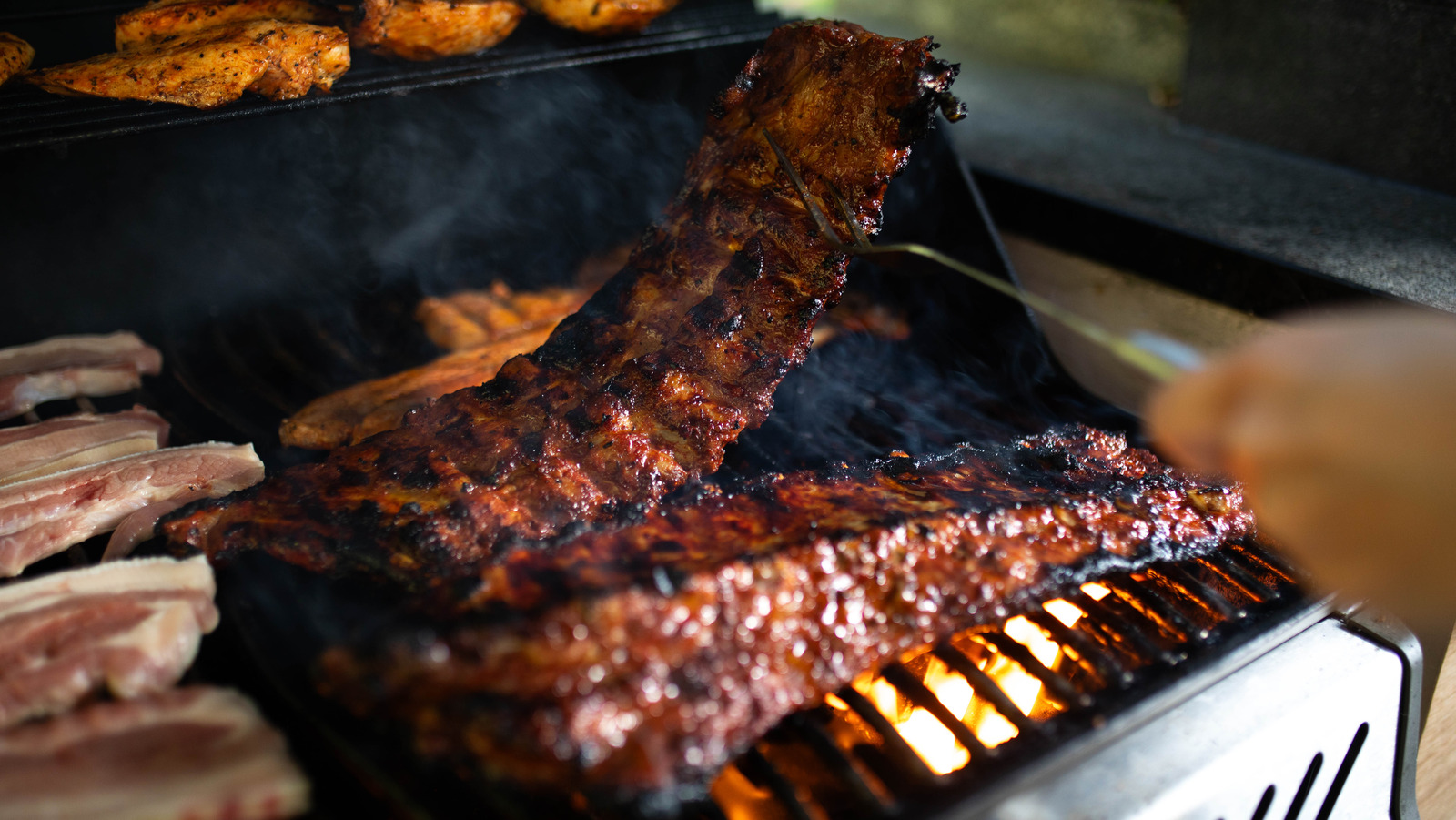 The Reason An Offset Grill Is Ideal When Cooking Pork And Beef Ribs At Once