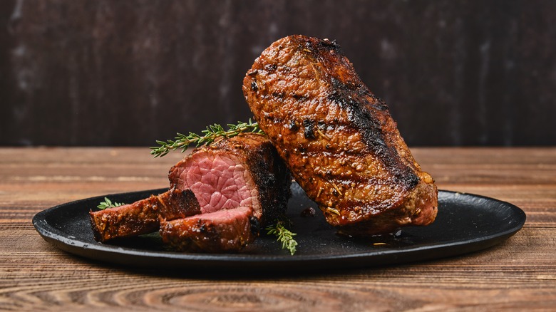 Steak on plate sliced in half