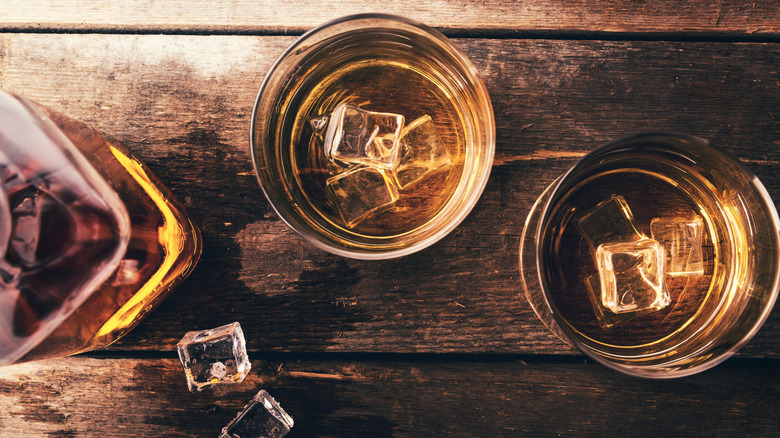 bourbon bottle and glasses