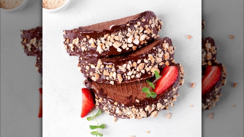 chocolate tacos garnished with nuts