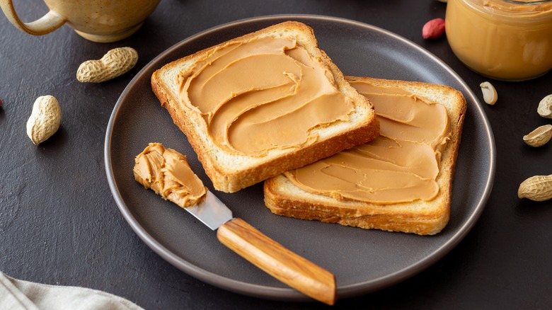 Peanut butter on two slices of toast