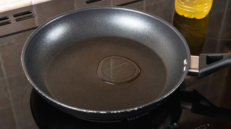 Oil in frying pan on stovetop