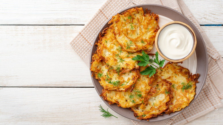 Plate of latkes with dip.