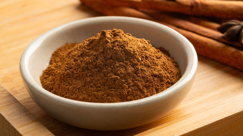 white bowl of ground cinnamon