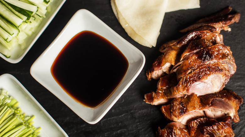Peking duck spread with duck and hoisin sauce