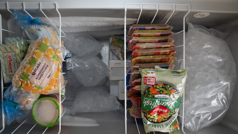 Organized chest freezer with hanging wire baskets