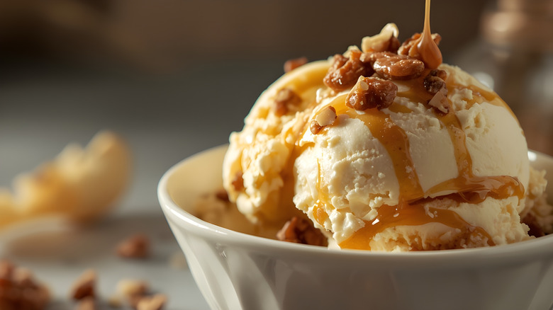 scoop of vanilla ice cream topped with caramel drizzle