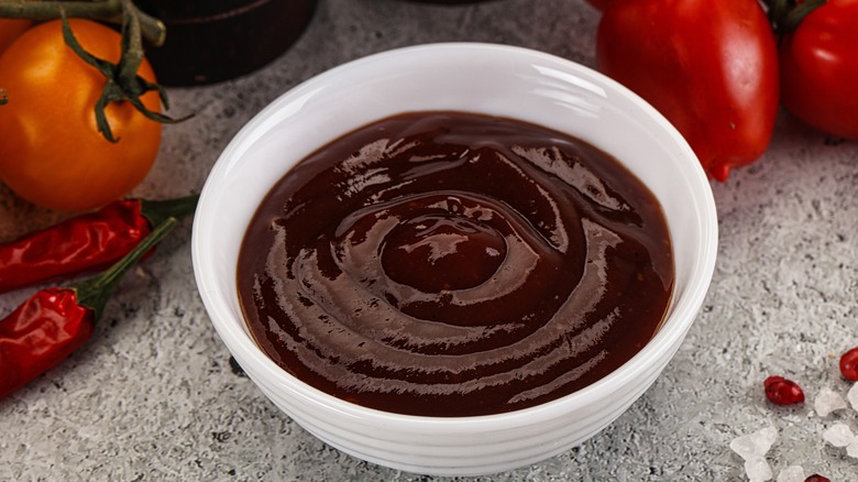 Closeup of barbecue sauce in a bowl on a kitchen counter
