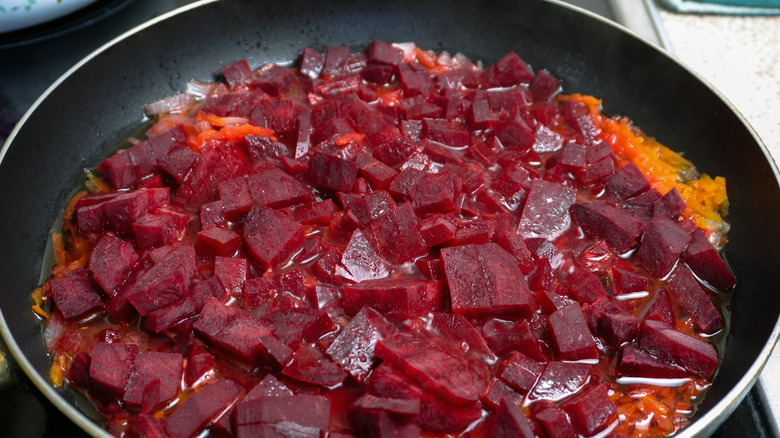 sauteeing beets in a sauce pan