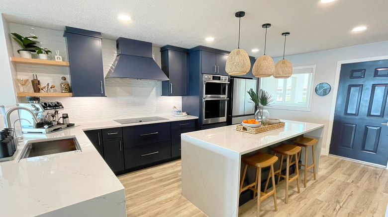 A kitchen with cleared countertops
