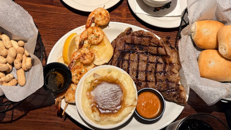 Steak, shrimp, rolls, and peanuts at Texas Roadhouse