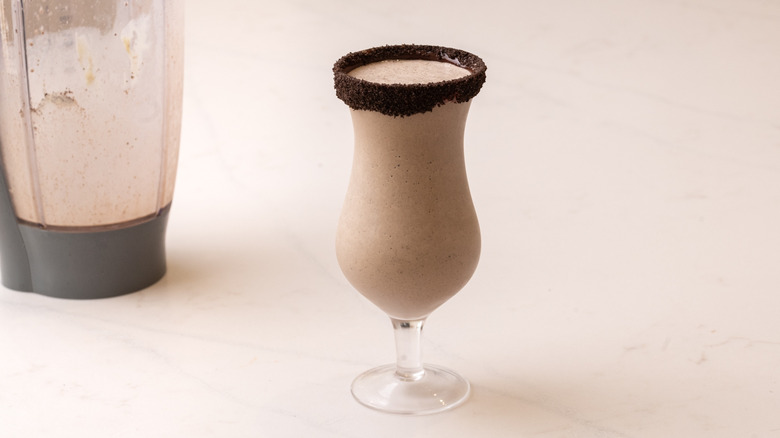 Oreo milkshake in chocolate-rimmed glass